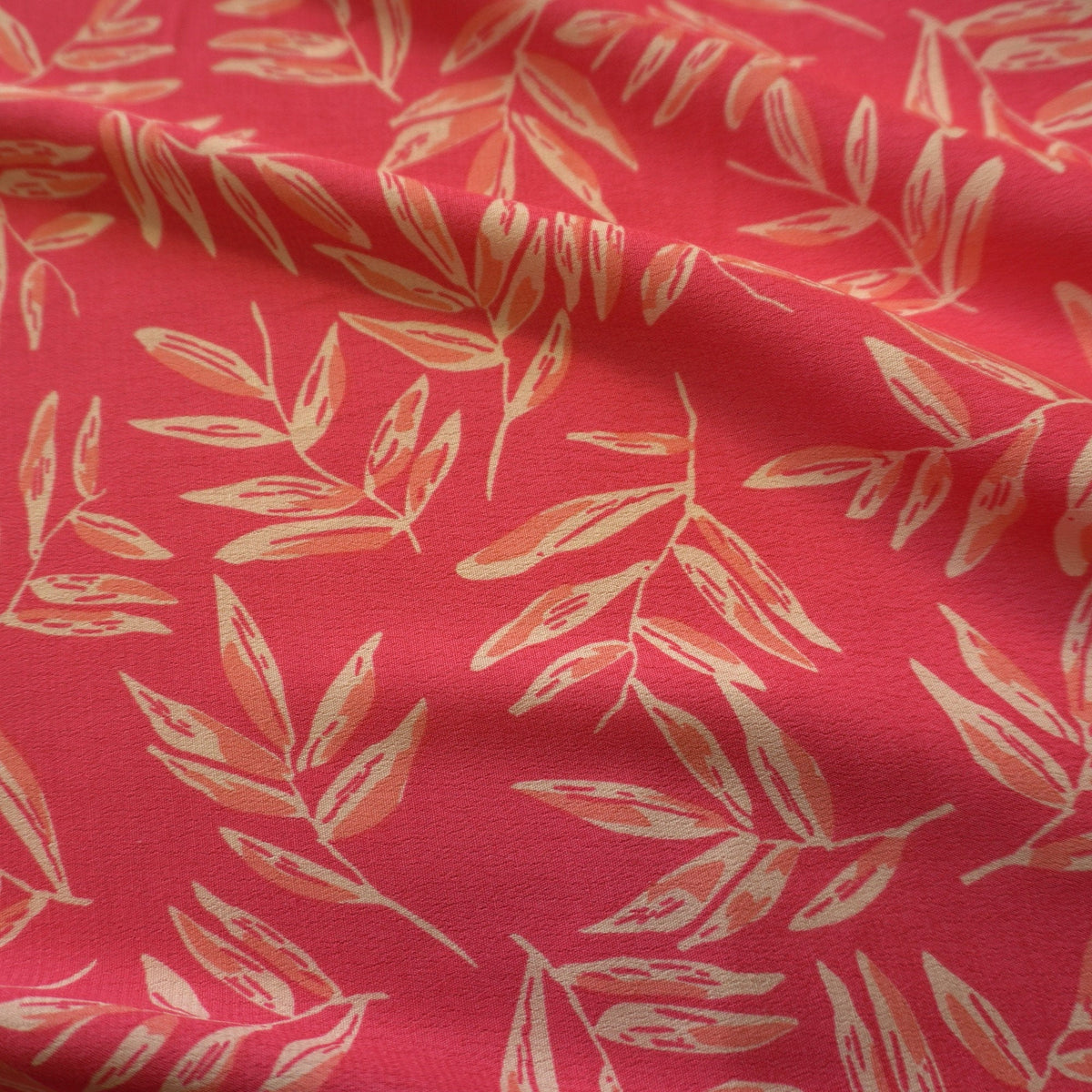 Viscose Dual Crepe Fabric - Leaves On Pink Red